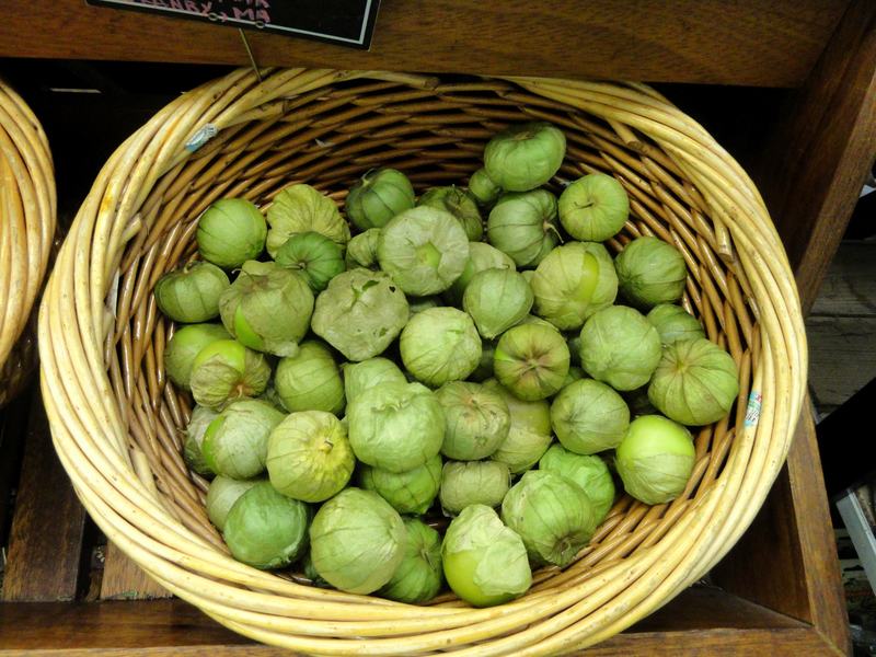 A basket of green tomatillos